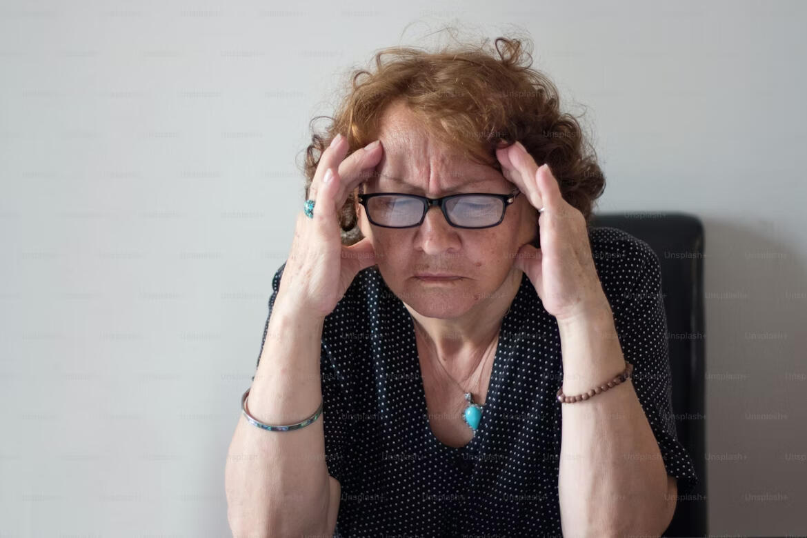 frustrated senior struggling with WiFi connectivity laptop Senior struggling with slow WiFi connectivity Mansfield MA